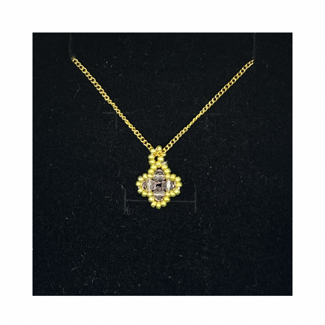 Light salmon and gold clover necklace
